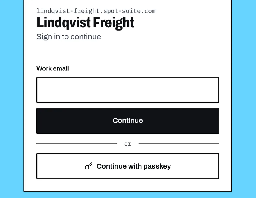 Workspace sign-in page with a work email field and a passkey button